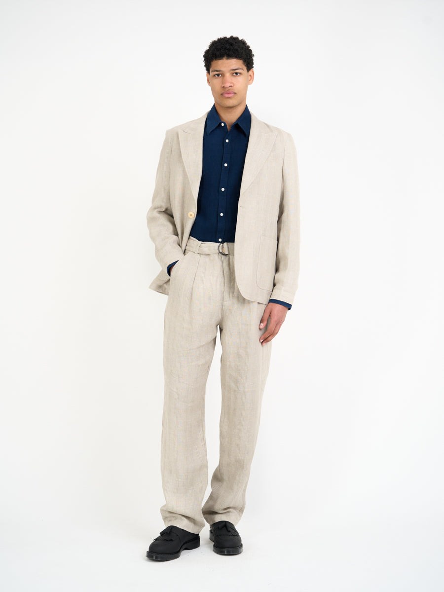 Model wearing Oliver Spencer Men's Single Breasted Peak Lapel Cream Linen Jacket 