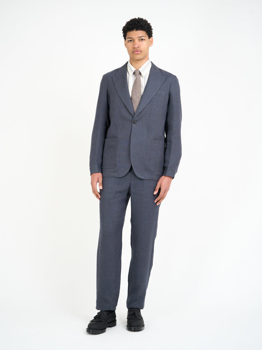 Model wearing Oliver Spencer Men's Single Breasted Peak Lapel Linen Jacket