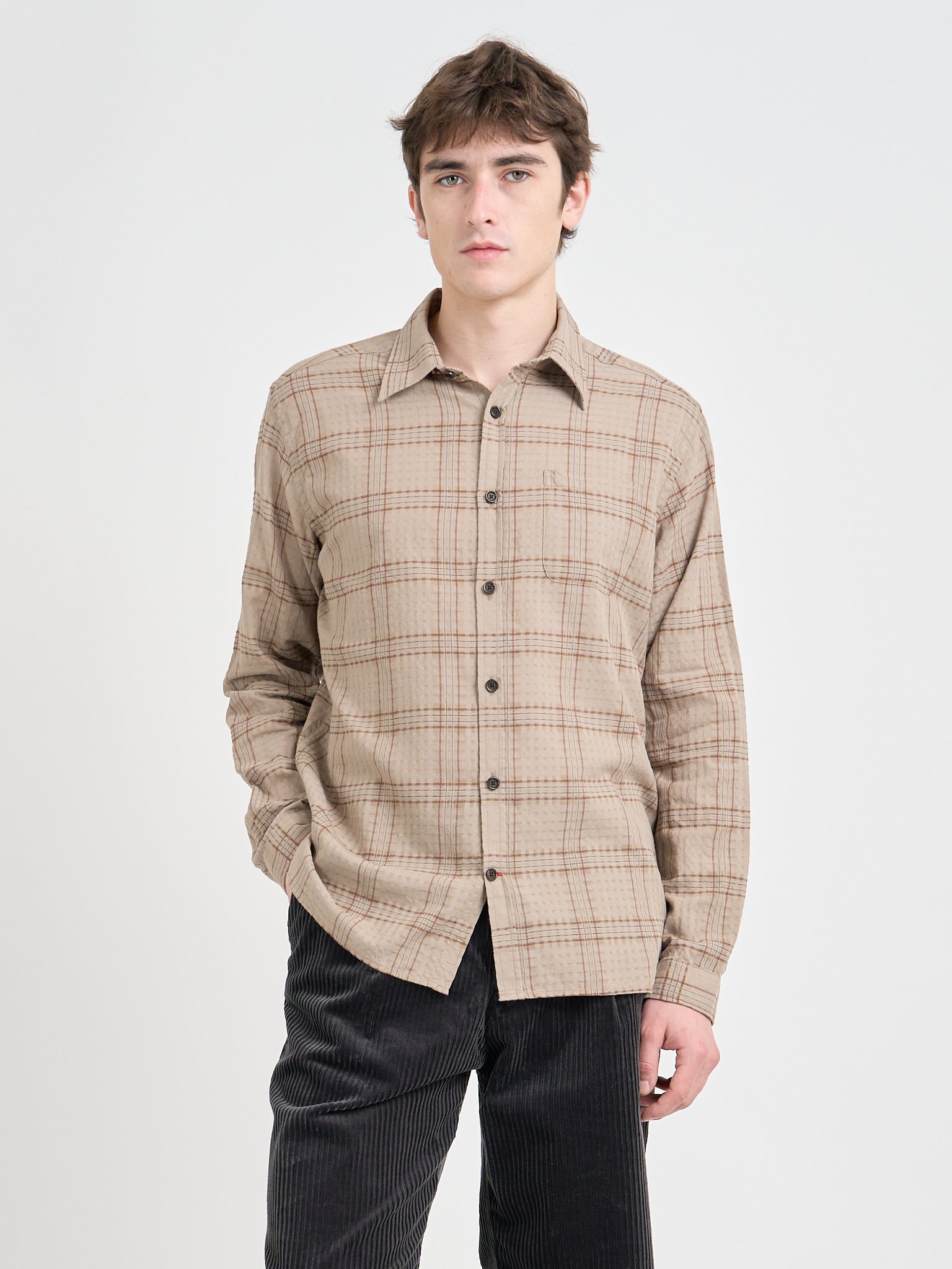 Model is wearing an Oliver Spencer New York Special Shirt in Connell Beige