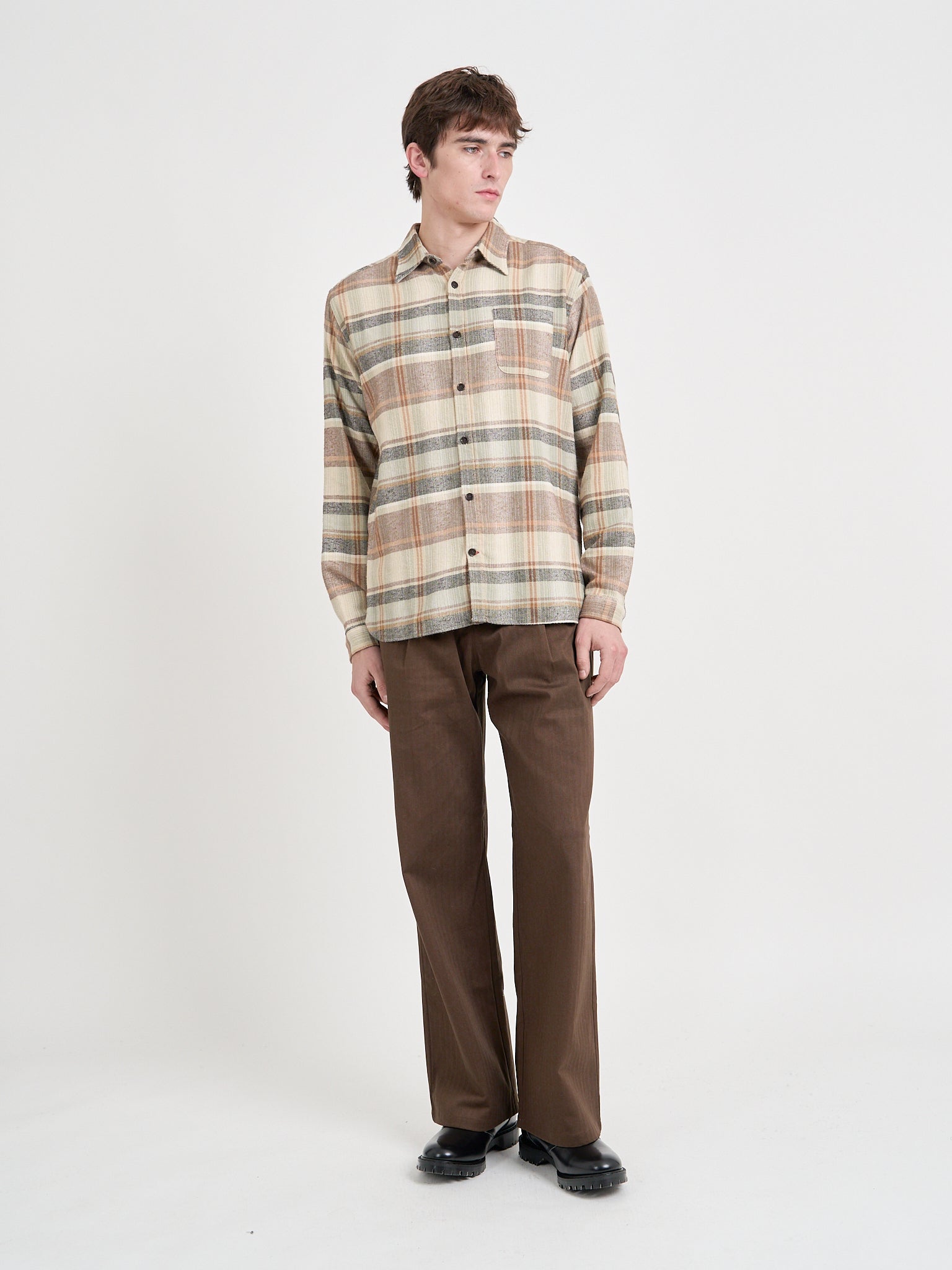 Model is wearing an Oliver Spencer New York Special Shirt in Robbins Multi
