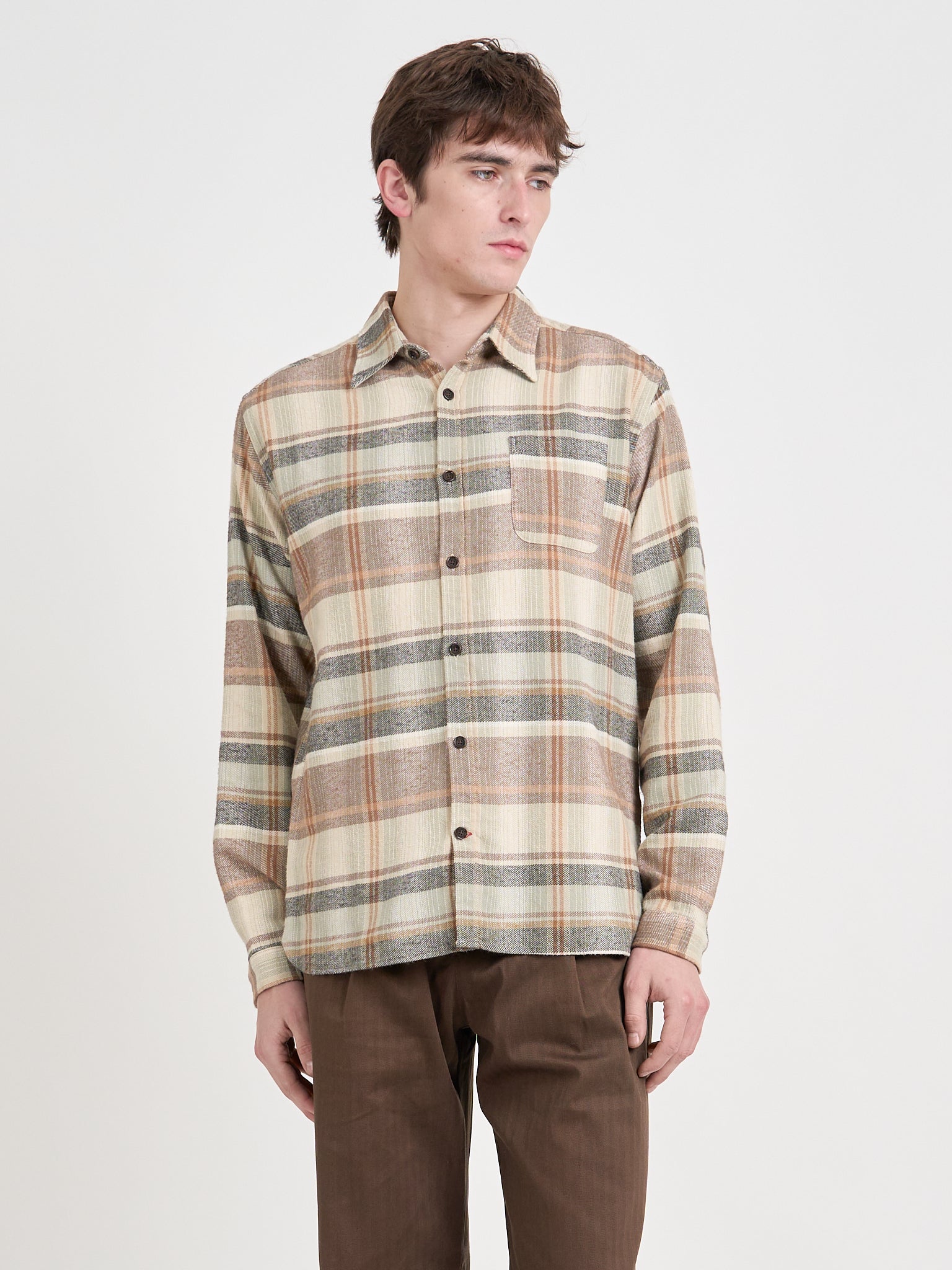 Model is wearing an Oliver Spencer New York Special Shirt in Robbins Multi
