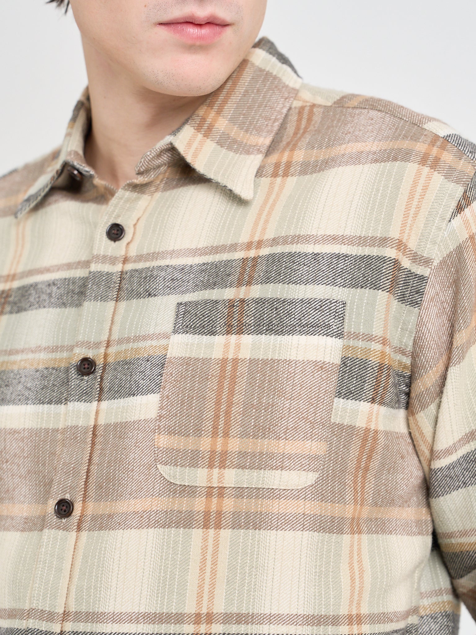 Model is wearing an Oliver Spencer New York Special Shirt in Robbins Multi