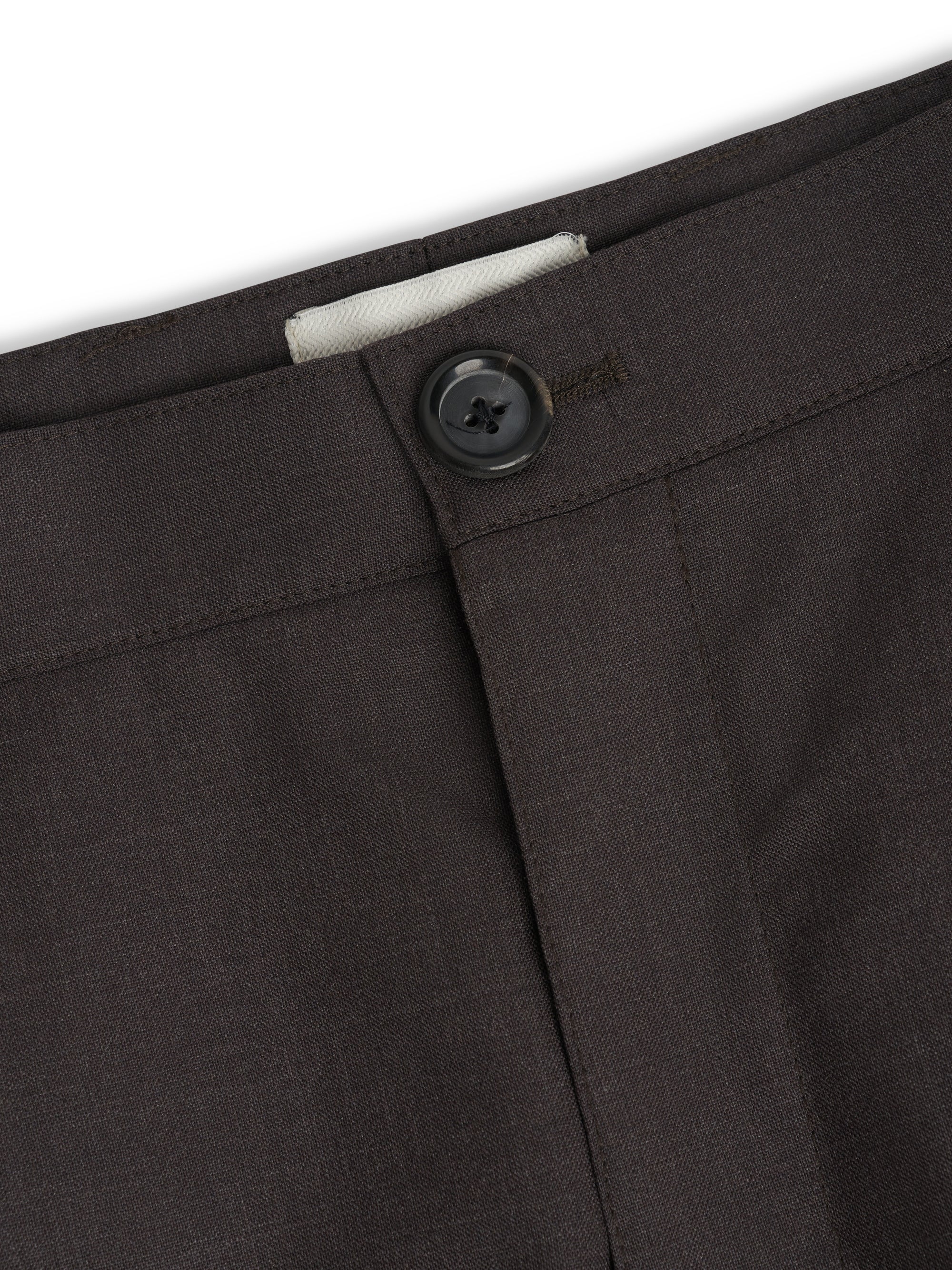 Waist detail showing button and fly fastening on Orsman trousers